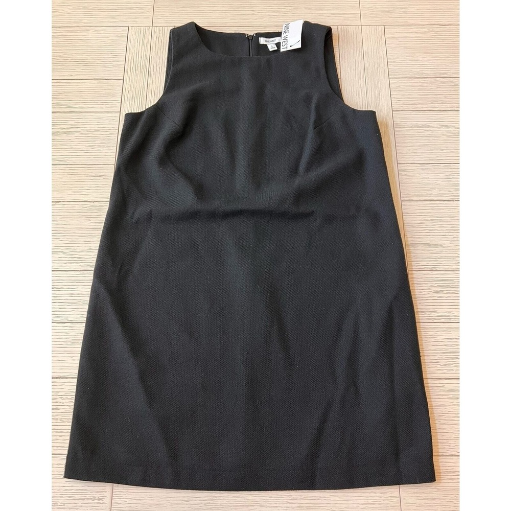 NWT Nine West black lined sheath dress w/ back zip. Wool blend. Knee length. L